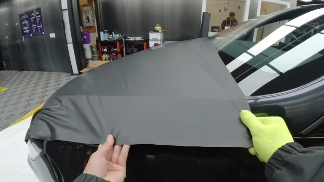 Stretchable Car Wrap Film Applied on Car Hood, Demonstrating Excellent Stretchability and Easy DIY Installation for Hassle-Free Vehicle Customization.