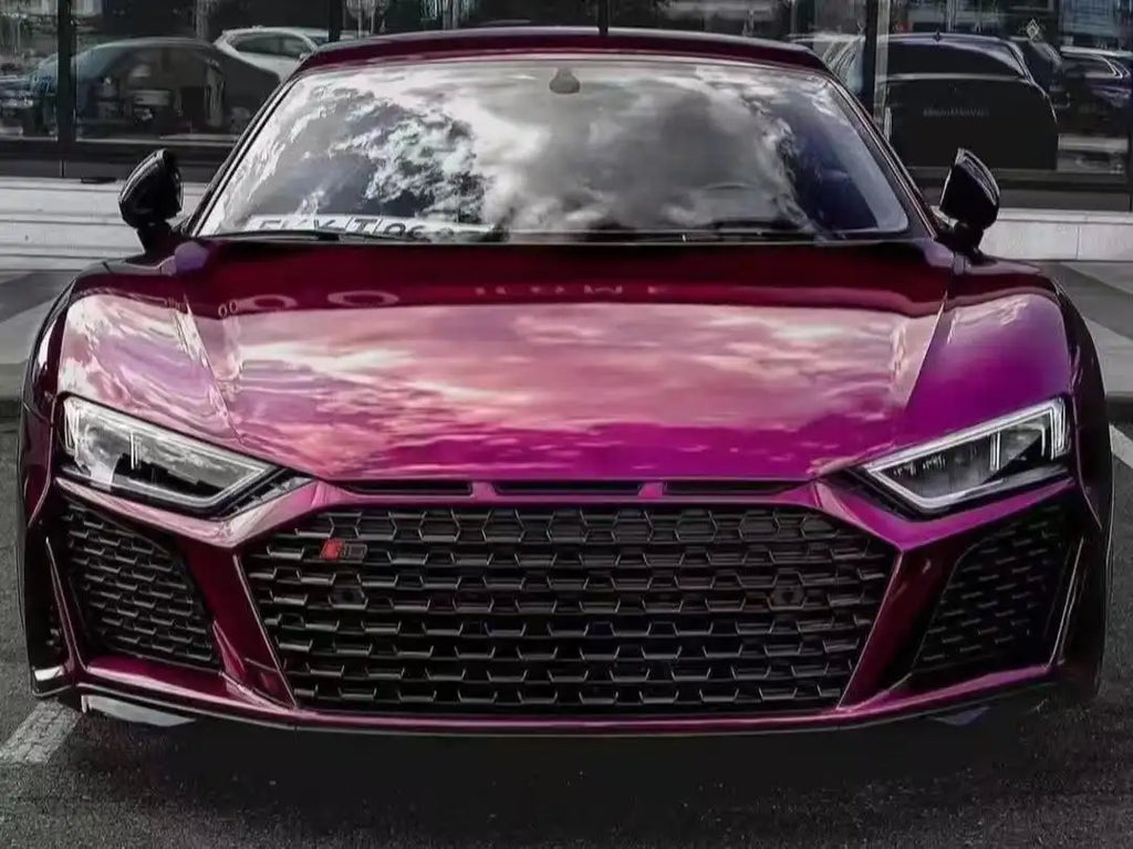 Front view of an Audi R8 wrapped in the authentic Audi Pearl Grape color - Kaleido