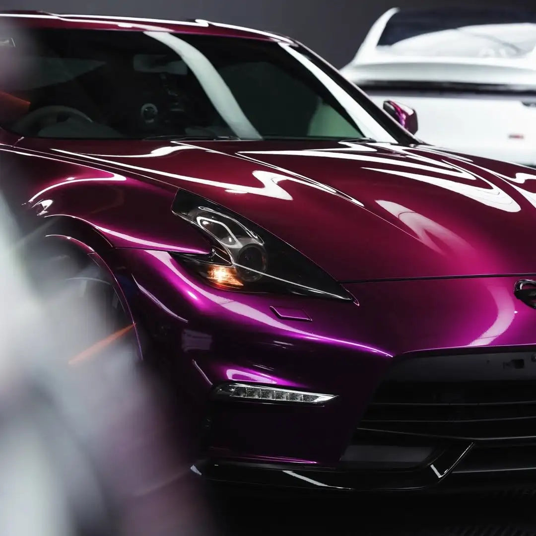 Close-up front-right shot of the Audi Pearl Grape wrap on a Nissan Z - detailed finish - Kaleido