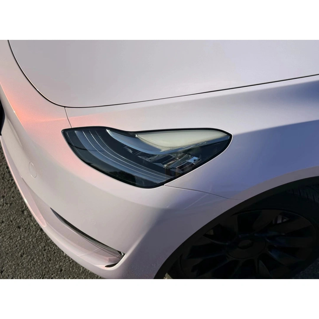Blossom Whisper vinyl on Tesla Model Y front-left hood area - soft color transition effect - Kaleido