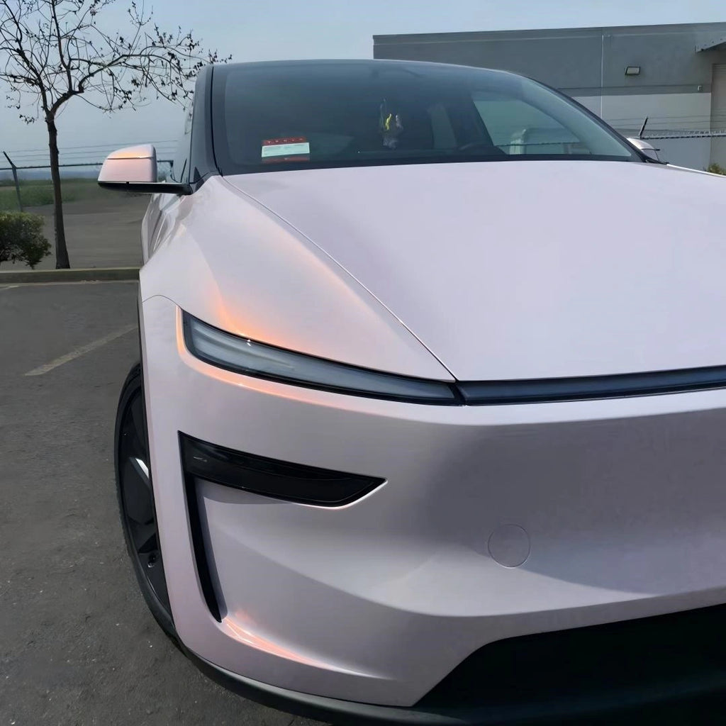 Blossom Whisper vinyl wrap on Tesla Model Y front-right corner - showcasing color shift on bumper and fender - Kaleido
