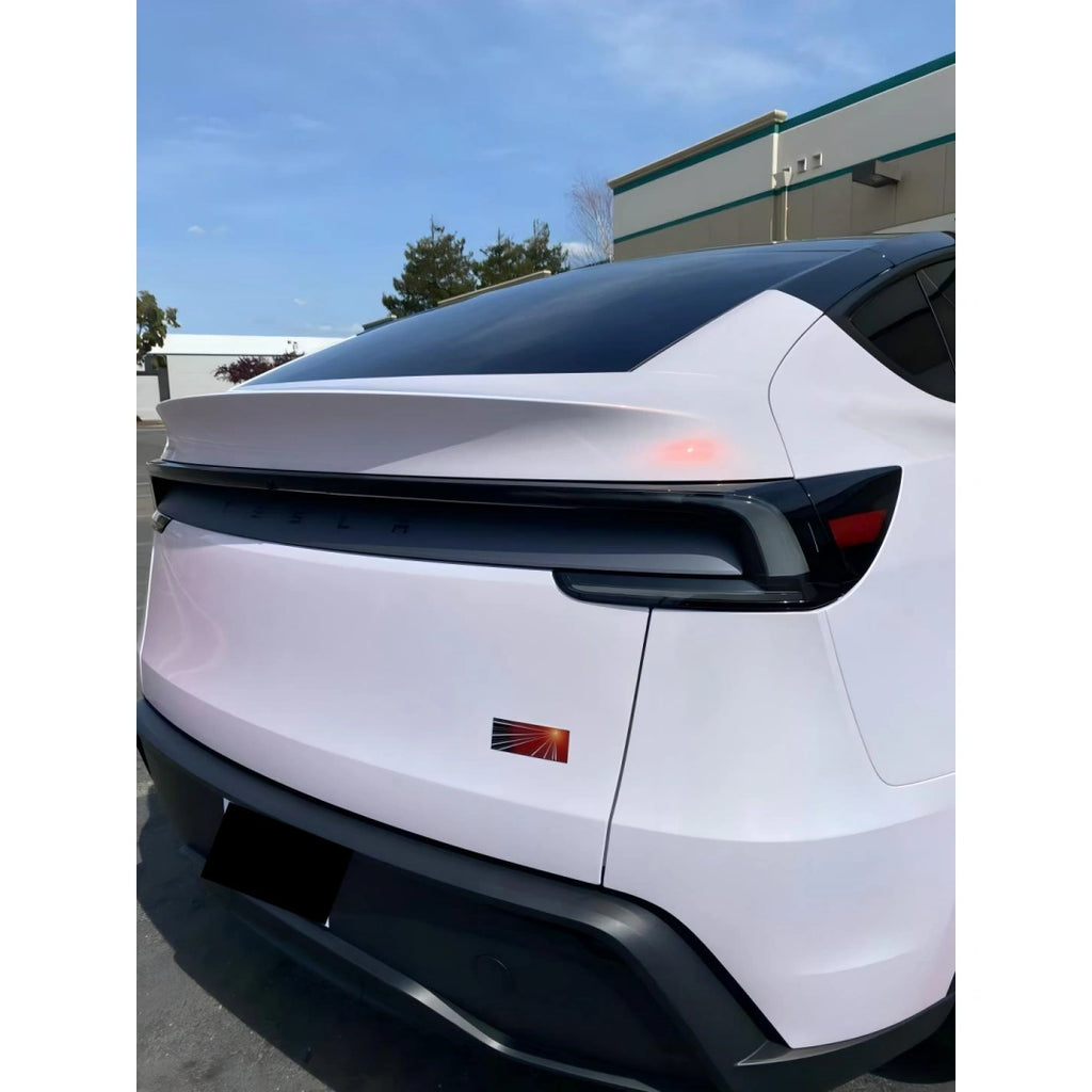 Blossom Whisper color shift film on Tesla Model Y rear-right - showcasing tailgate and quarter panel - Kaleido