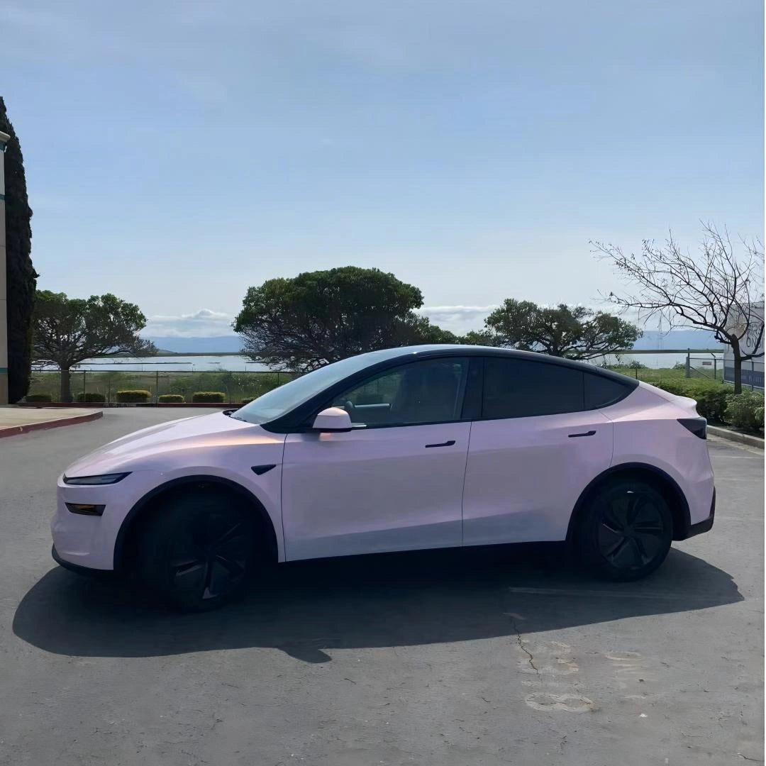 Tesla Model Y in Blossom Whisper color shift wrap - clean side profile showing elegant pink to white transition - Kaleido