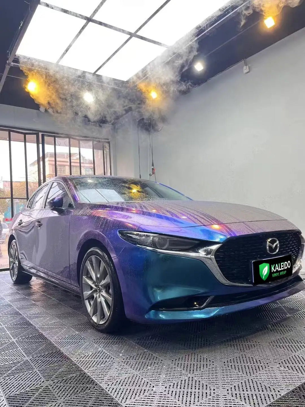 Mazda3 Axela in Diamond Purple Blue color shift wrap - front-right view - Kaleido