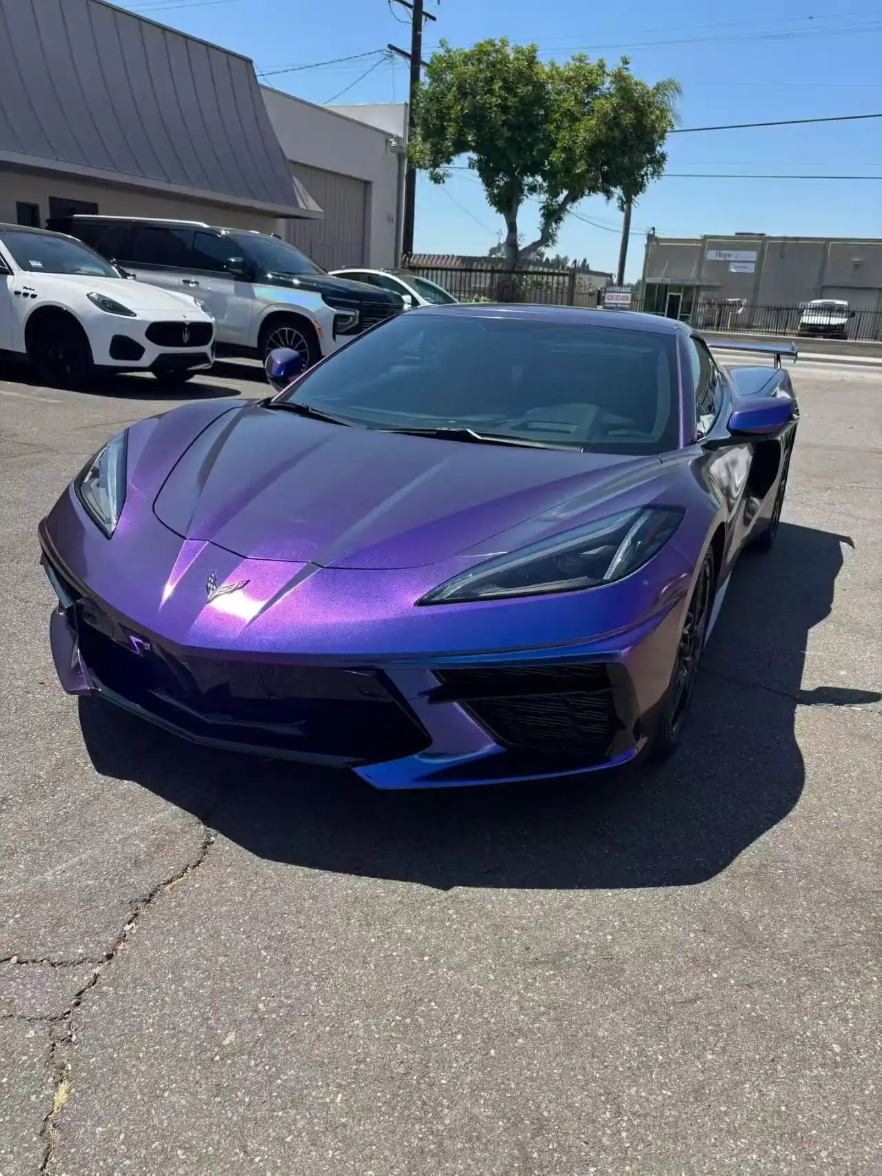 Front view of Corvette C8 with Diamond Purple Red color shift vinyl - showcasing purple to red effect - Kaleido