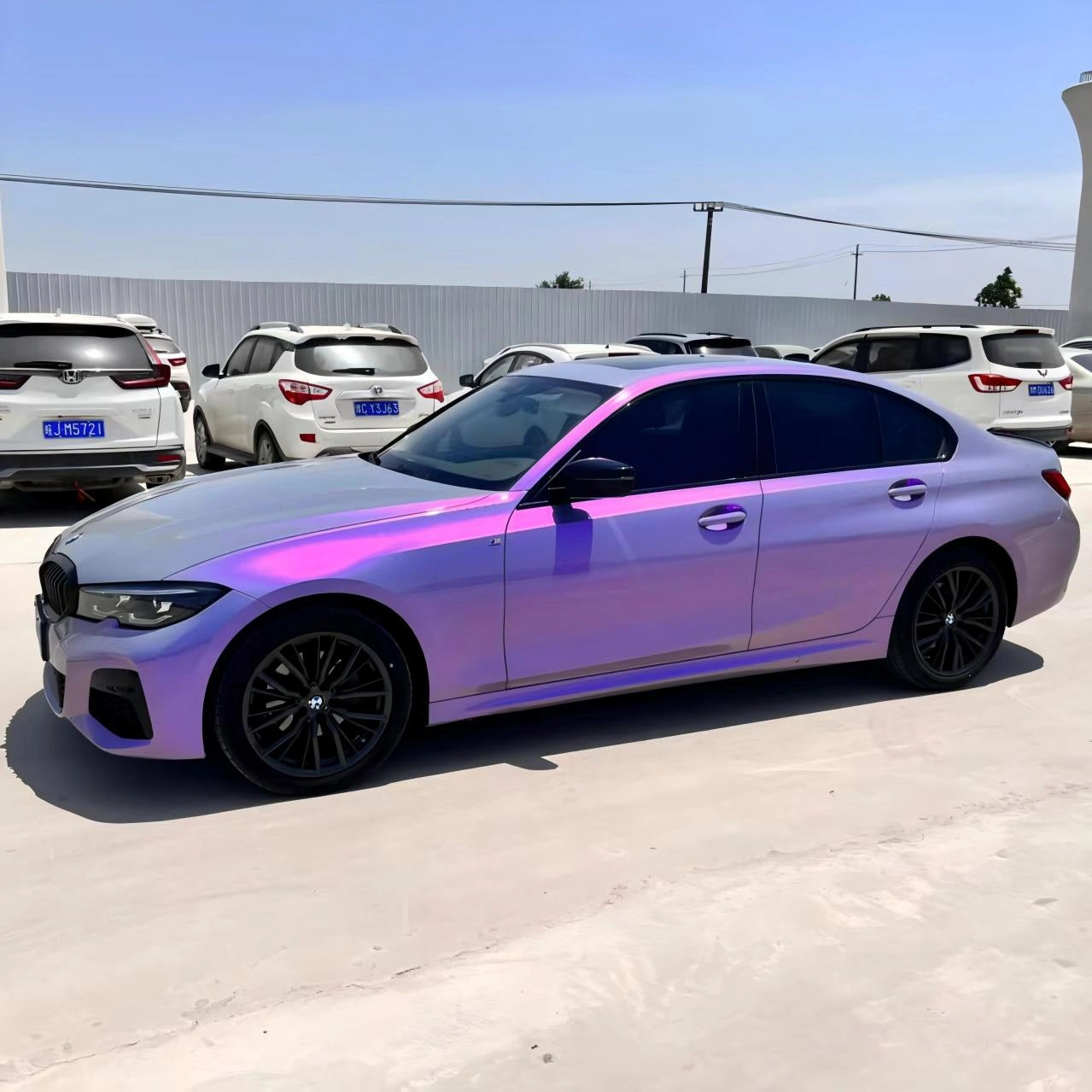 Mystic Violet color shift wrap on BMW 1 Series in natural lighting - elegant purple tones - Kaleido