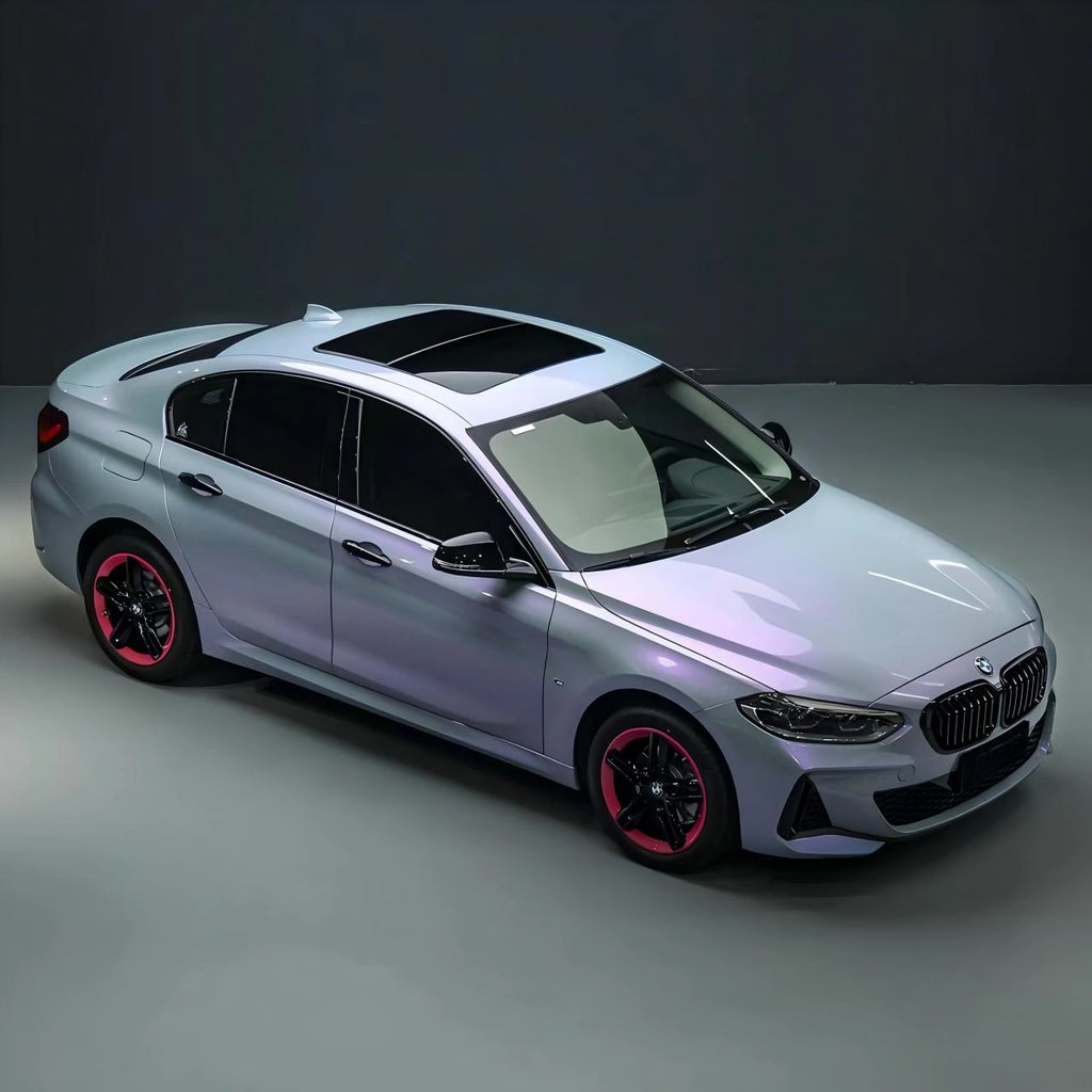 Hero shot of BMW 3 Series in Mystic Violet color shift wrap - dynamic 45-degree front angle - Kaleido