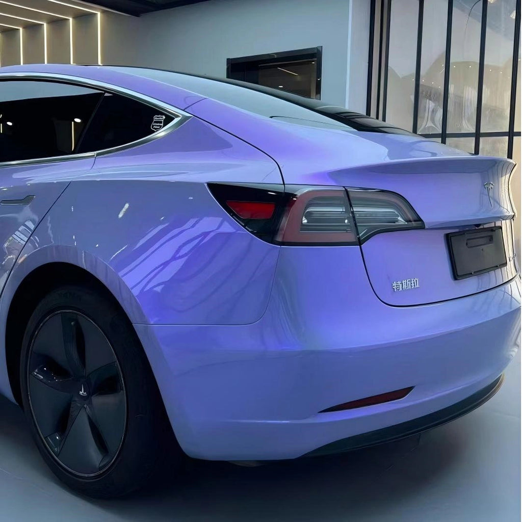 Tesla Model 3 with Mystic Violet color shift film - rear-left view - Kaleido