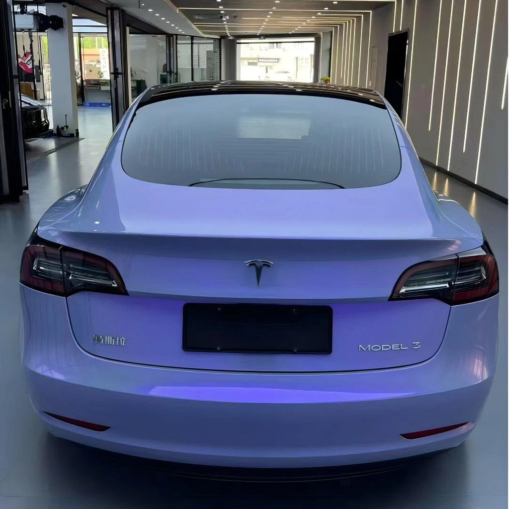 Rear view of Tesla Model 3 wrapped in Mystic Violet color shift film - Kaleido