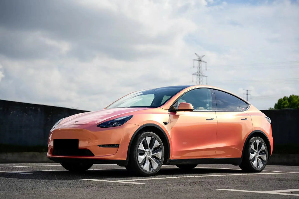 Tesla Model Y in Neon Gold Pink color shift - front-left view - Kaleido