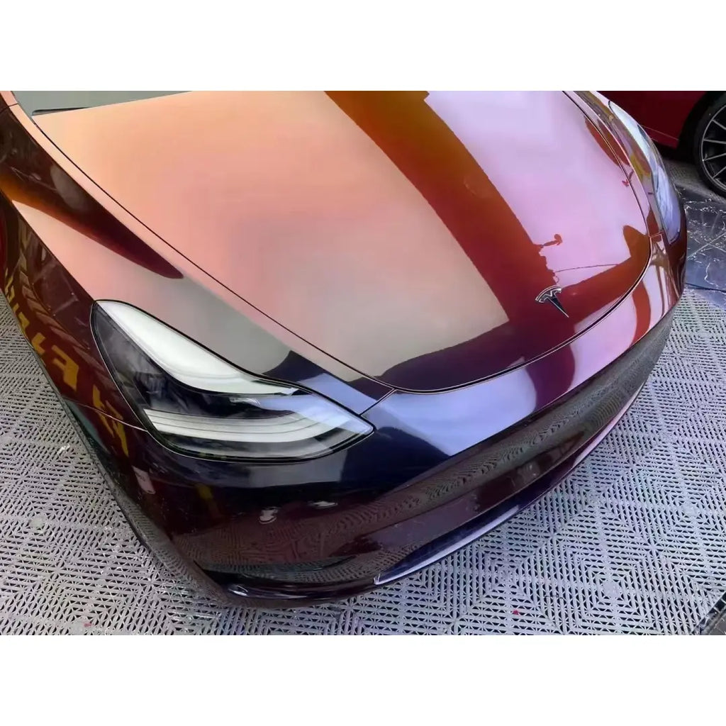 Onyx Ignition color shift wrap on Tesla Model Y front-right hood panel - Kaleido