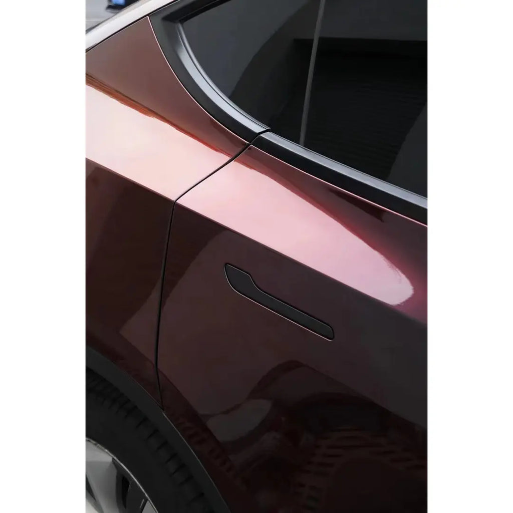 Extreme close-up of Onyx Ignition color shift wrap on Tesla Model Y rear door - Kaleido