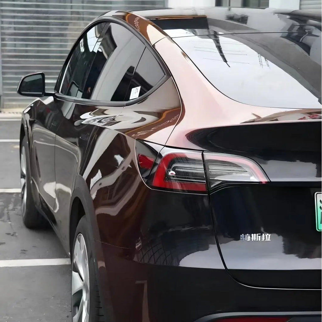 Tesla Model Y with Onyx Ignition color shift film - rear-left view - Kaleido