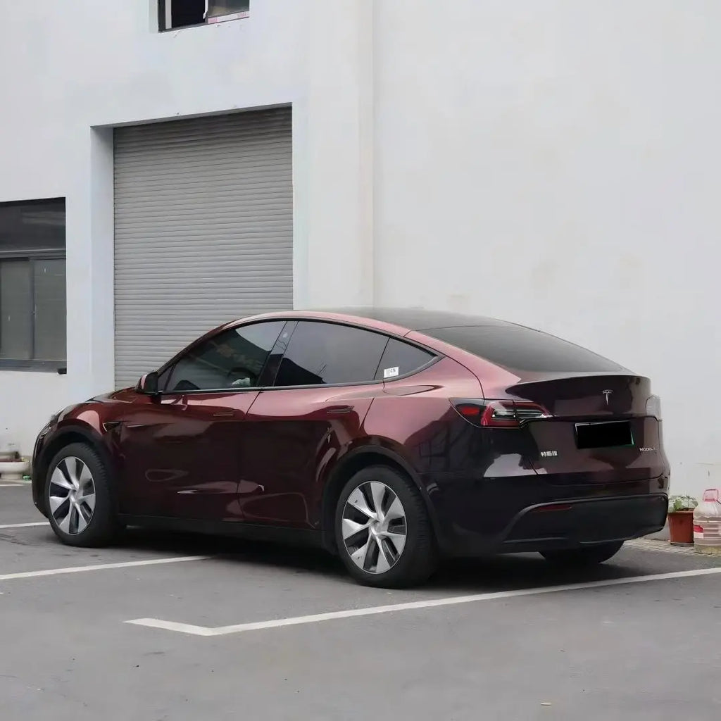 Wide rear-left view of Onyx Ignition wrapped Tesla Model Y - showing full SUV profile - Kaleido