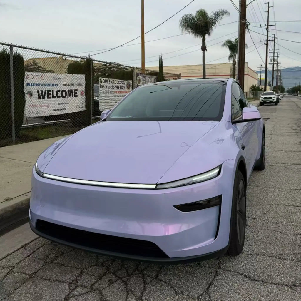 Close-up front-left detail of Color Shift Pearl Blue Pink wrap on Tesla Model Y - Kaleido