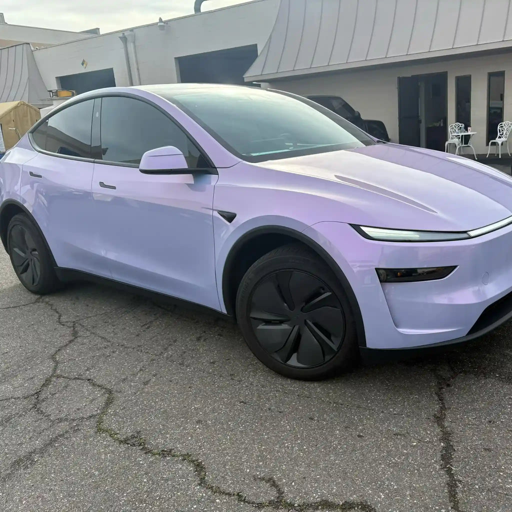 Close-up front-right view of Color Shift Pearl Blue Pink vinyl on Tesla Model Y - Kaleido