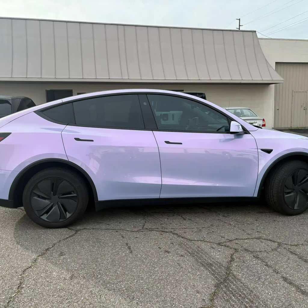 Right side profile of Tesla Model Y in Color Shift Pearl Blue Pink color shift film - Kaleido