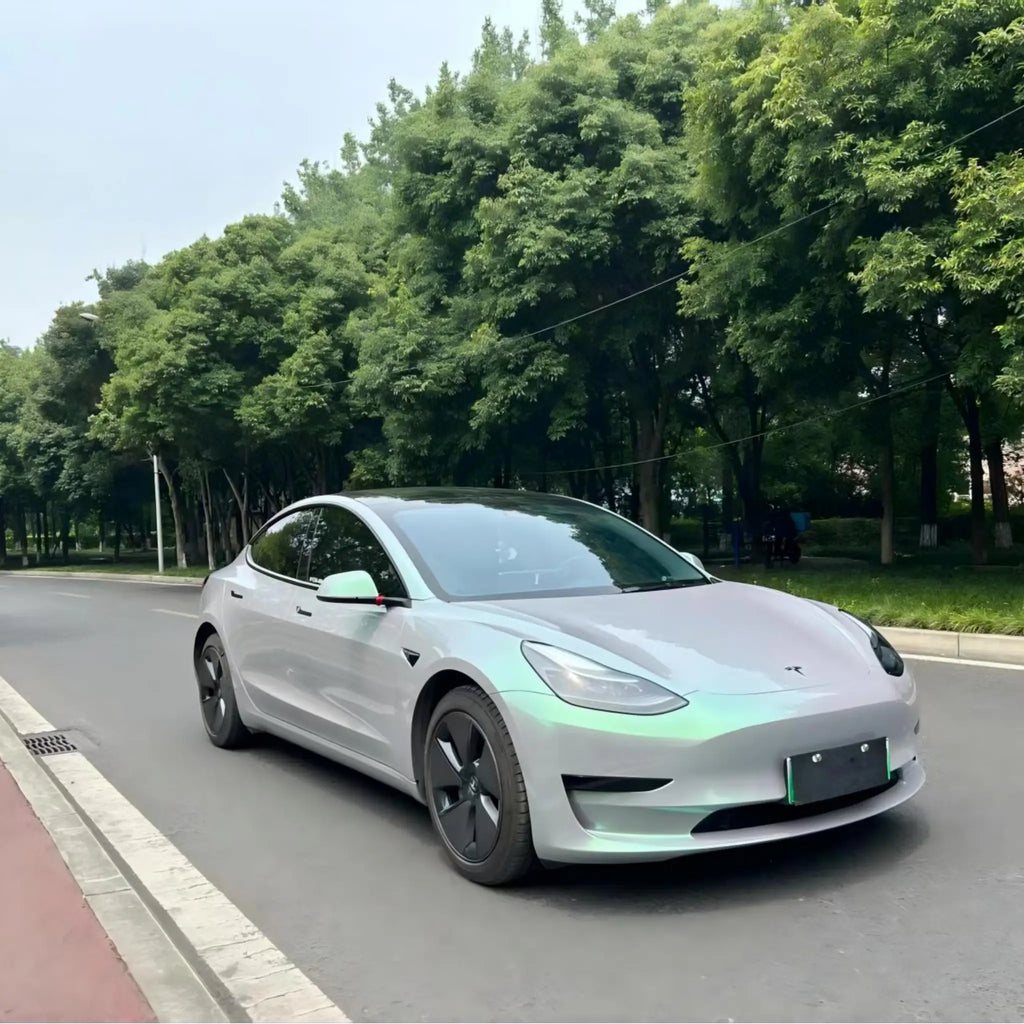 Tesla Model 3 in Phantom Moss color shift vinyl - front-right angle showcasing color change - Kaleido