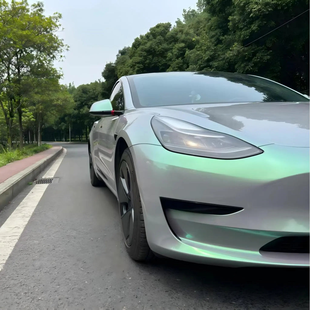 Close-up shot of Phantom Moss color shift wrap on Model 3 front-right - Kaleido