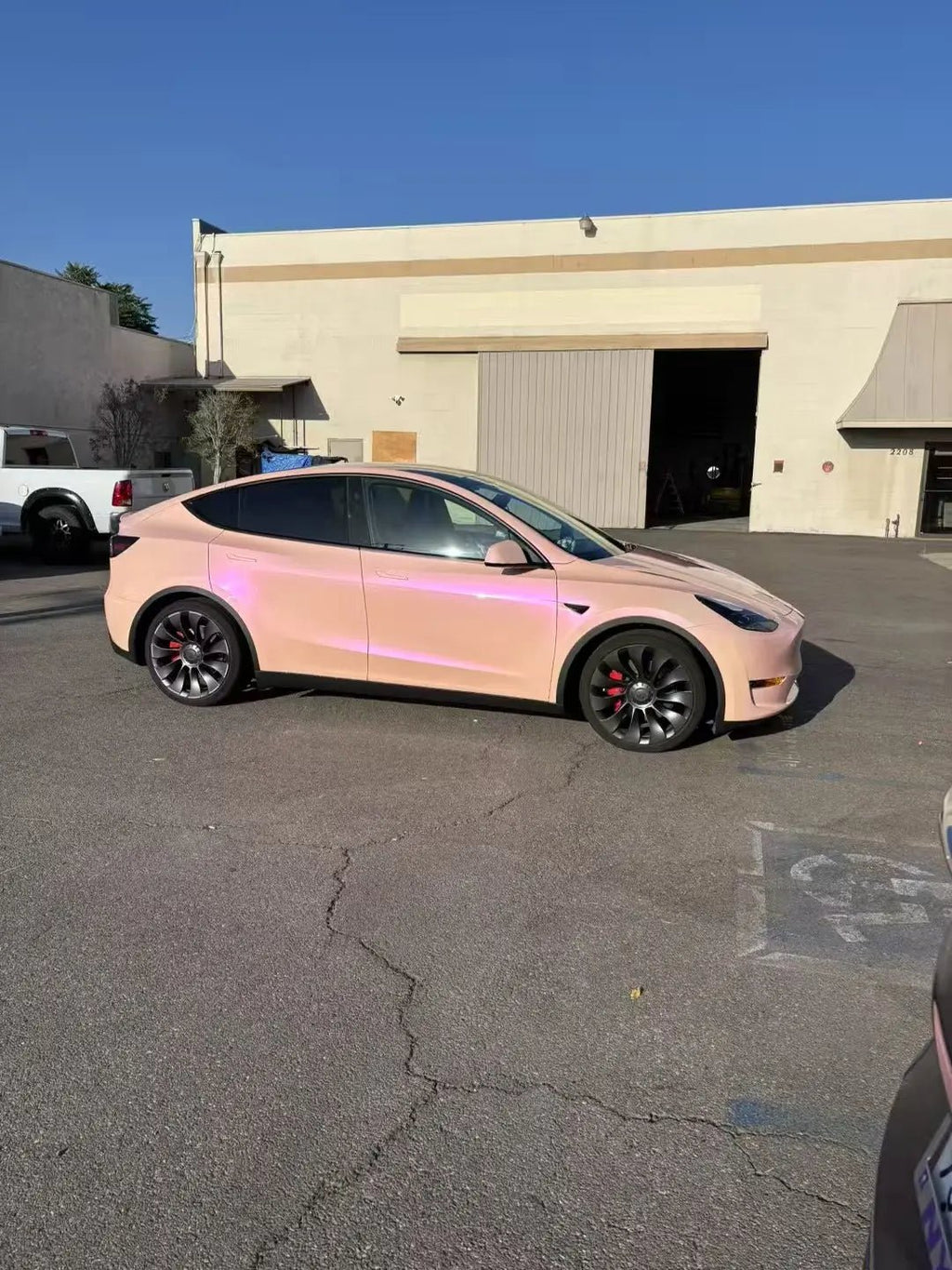 Tesla Model Y in Color Shift Pink Purple wrap - right side profile - Kaleido