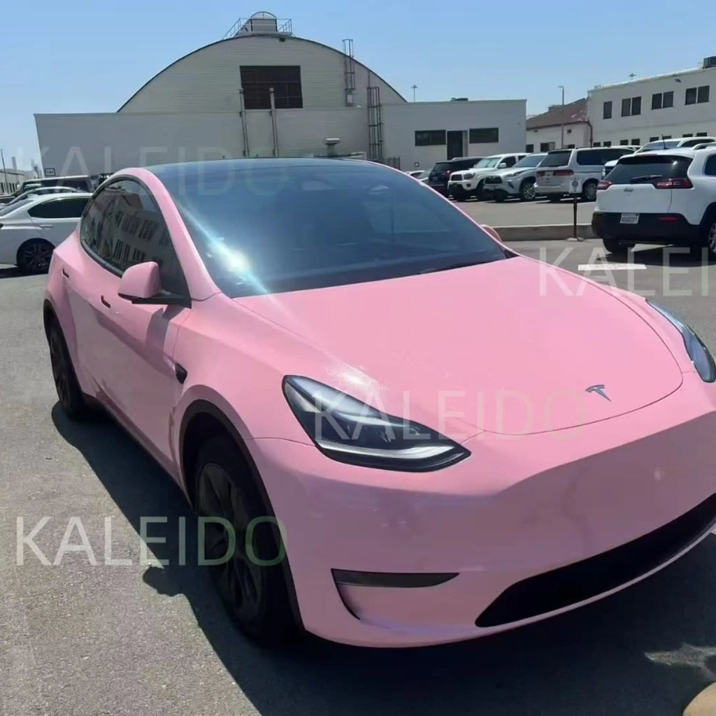 Diamond Iridescent Rouge Pink wrap on Tesla Model Y front-right - soft iridescent glow - Kaleido