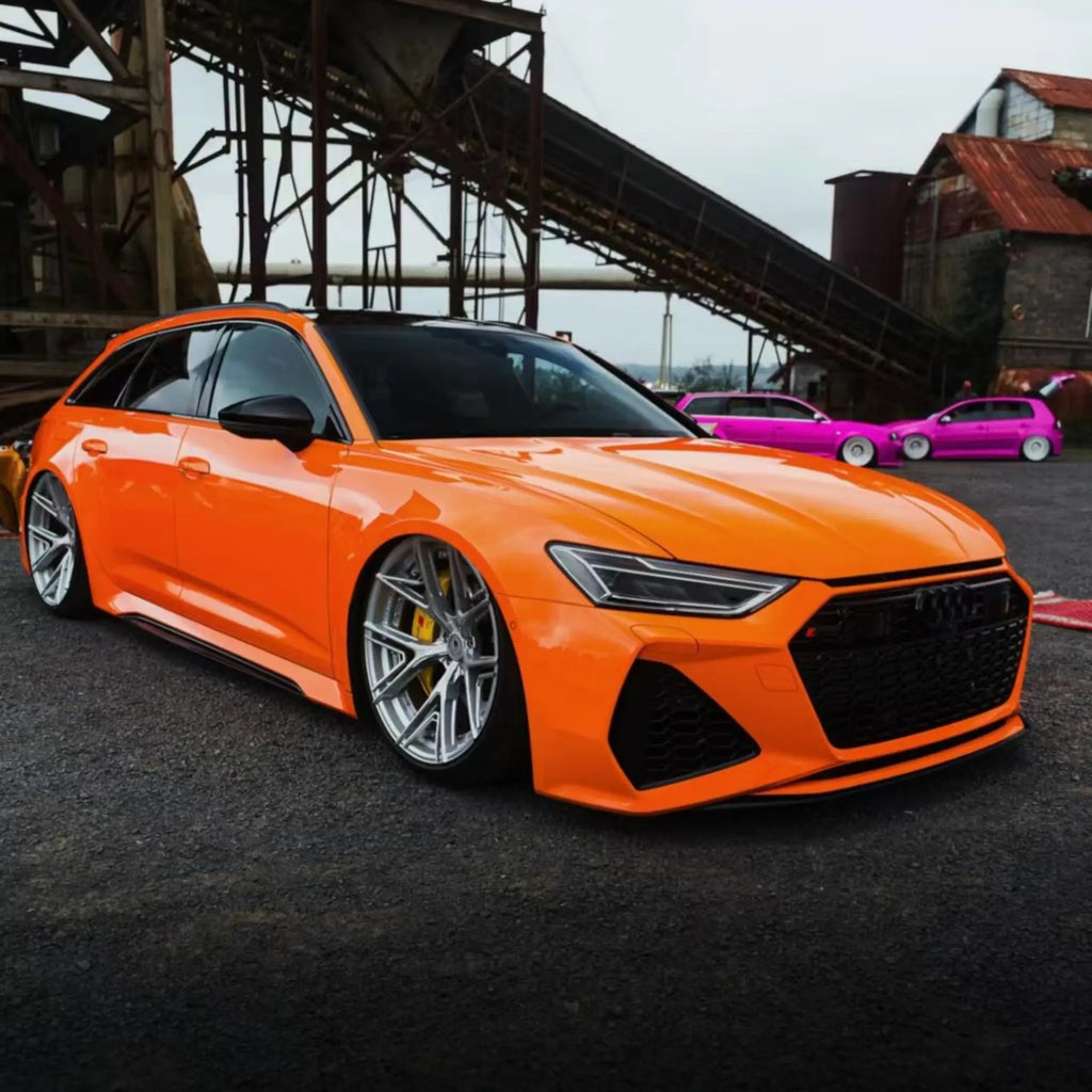 Gloss Hermès Orange wrap on an Audi RS6 Avant (C8) - front-right angle - Kaleido