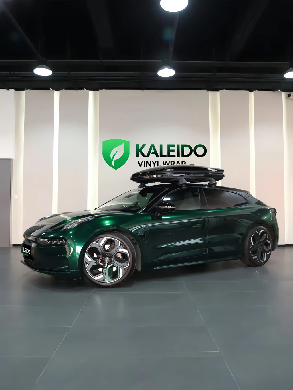 Left side profile of Zeekr 001 with Gloss Metallic Agate Green metallic wrap - Kaleido