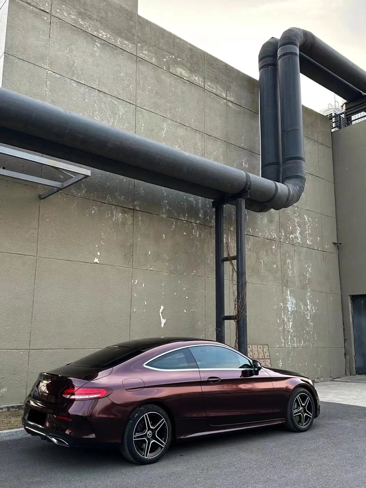 Mercedes-Benz C-Class Coupe in Gloss Metallic Black Rose vinyl - rear-right view - Kaleido