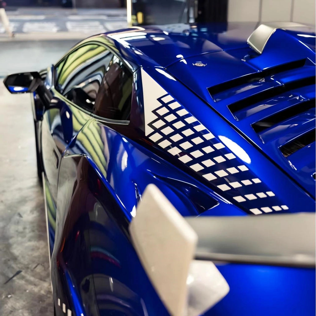 Deep Blueberry Metallic wrap on Lamborghini Huracán STO - rear-side profile showing roof and window details - Kaleido