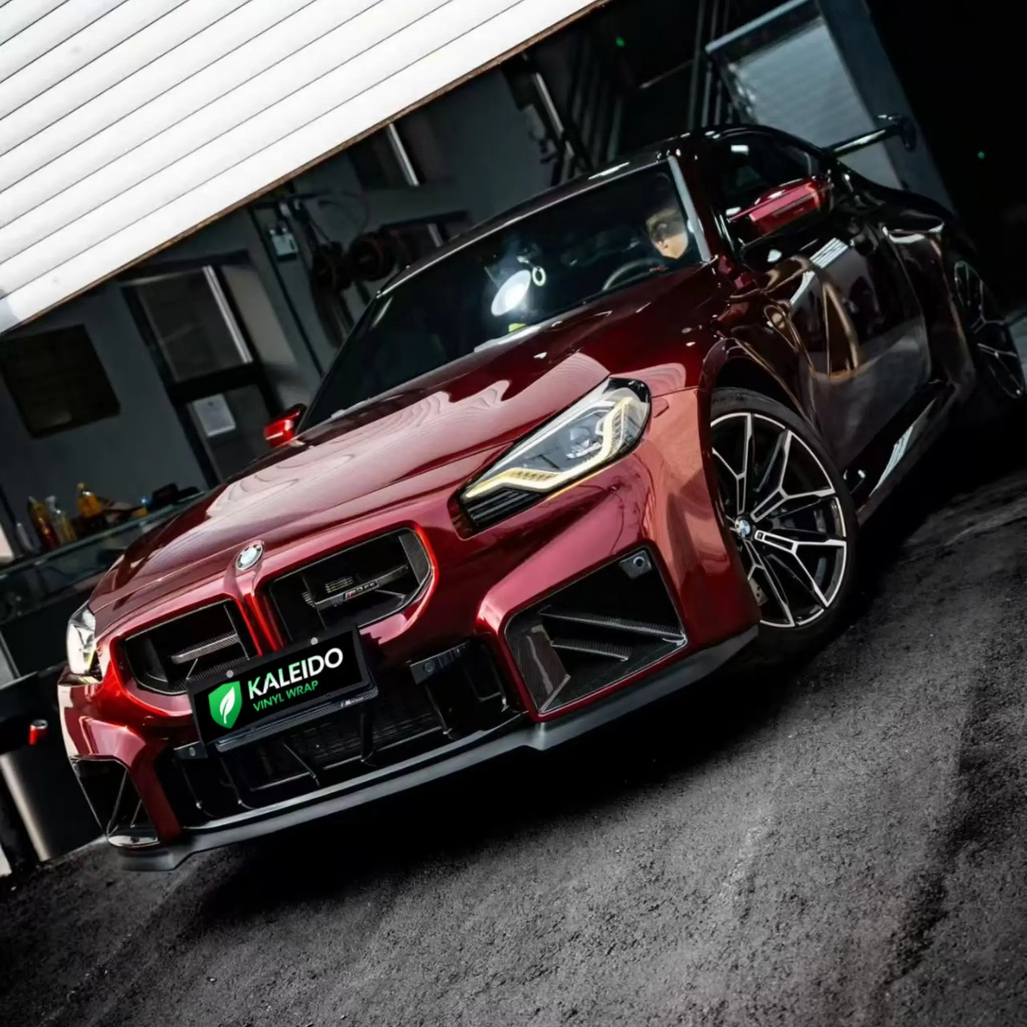 Front view of BMW M2 with Gloss Metallic Dragon Blood wrap - intense red liquid gloss - Kaleido