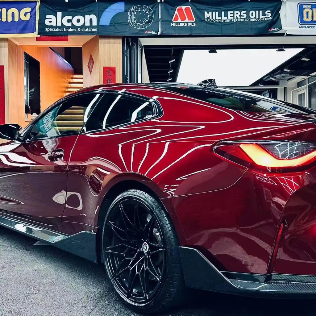 Gloss Metallic Dragon Blood vinyl on BMW M2 - rear-left angle view - Kaleido