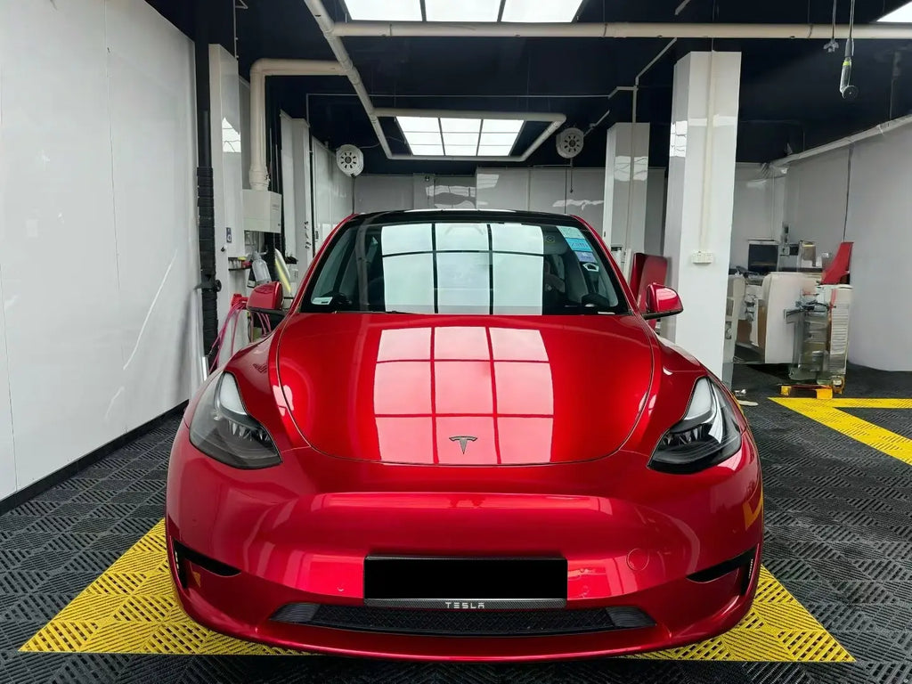 Front view of Gem Red wrapped Tesla Model Y - showcasing full front fascia - Kaleido