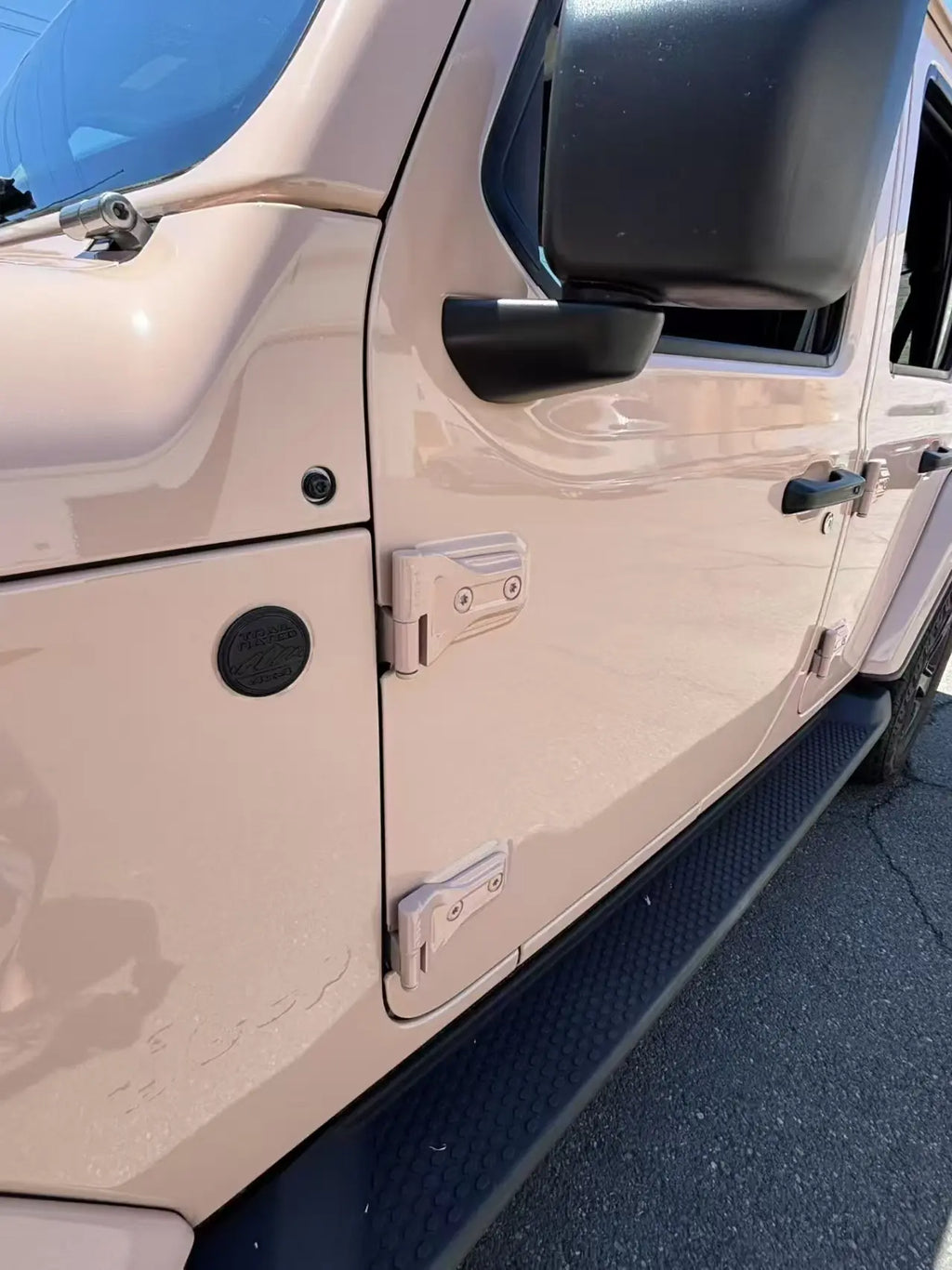 Close-up of Gloss Milktea wrap on Jeep Wrangler left fender - mirror-like gloss - Kaleido