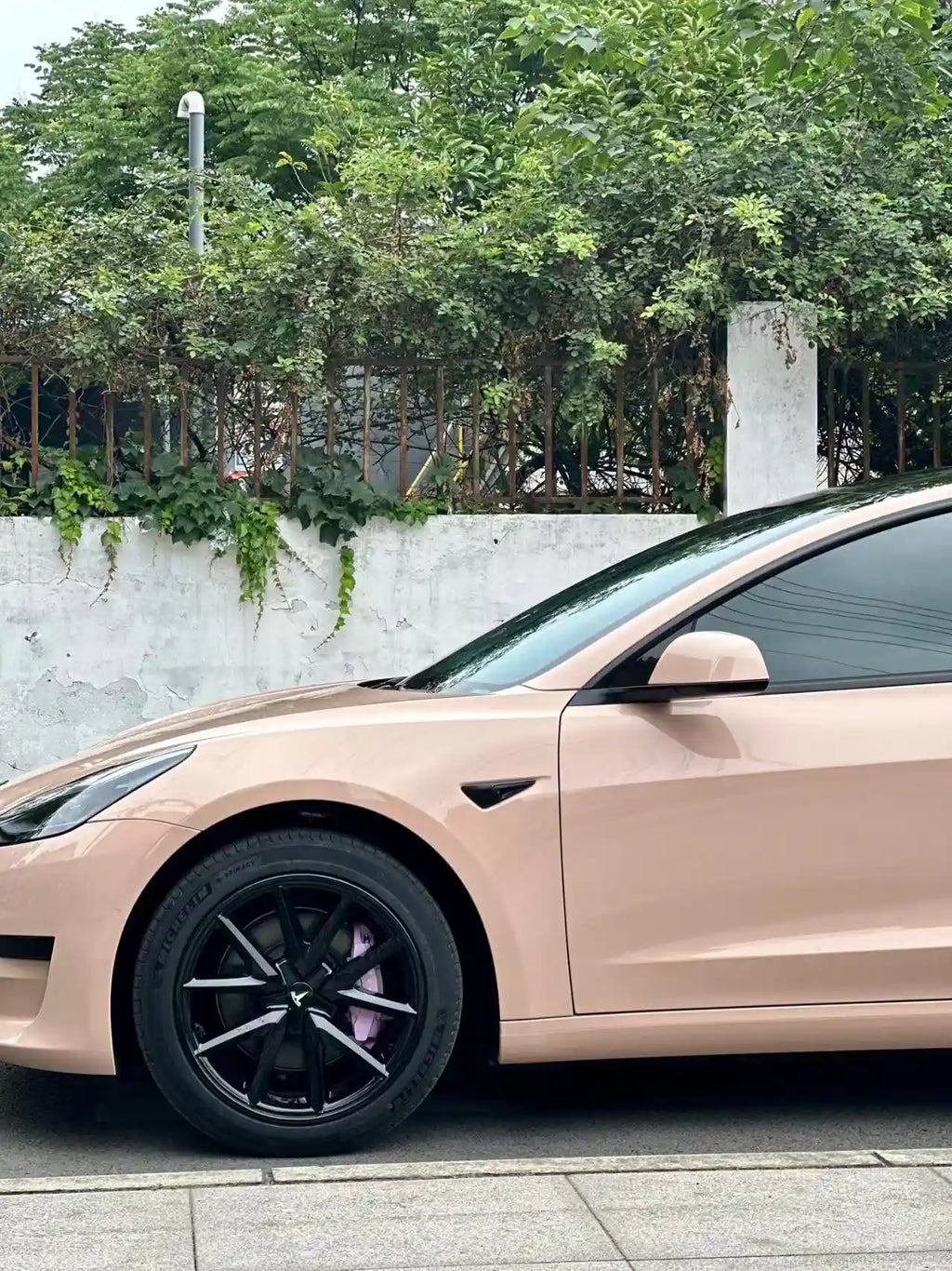Tesla Model 3 in Gloss Milktea vinyl - left front corner detail - Kaleido