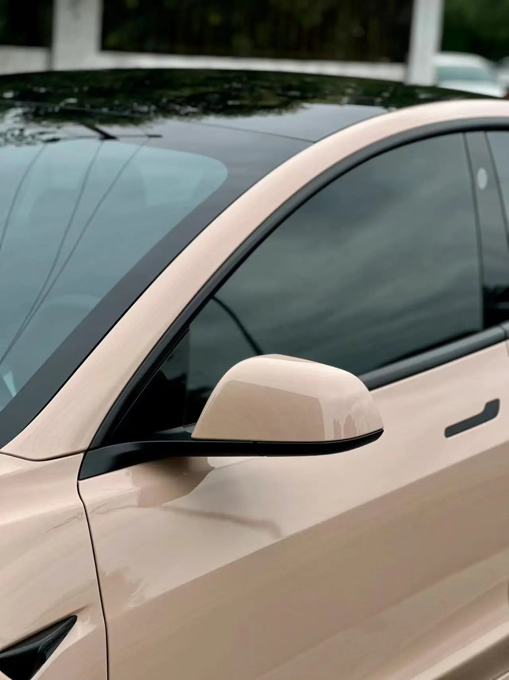 Detailed close-up of Gloss Milktea vinyl on Tesla Model 3 side mirror - Kaleido