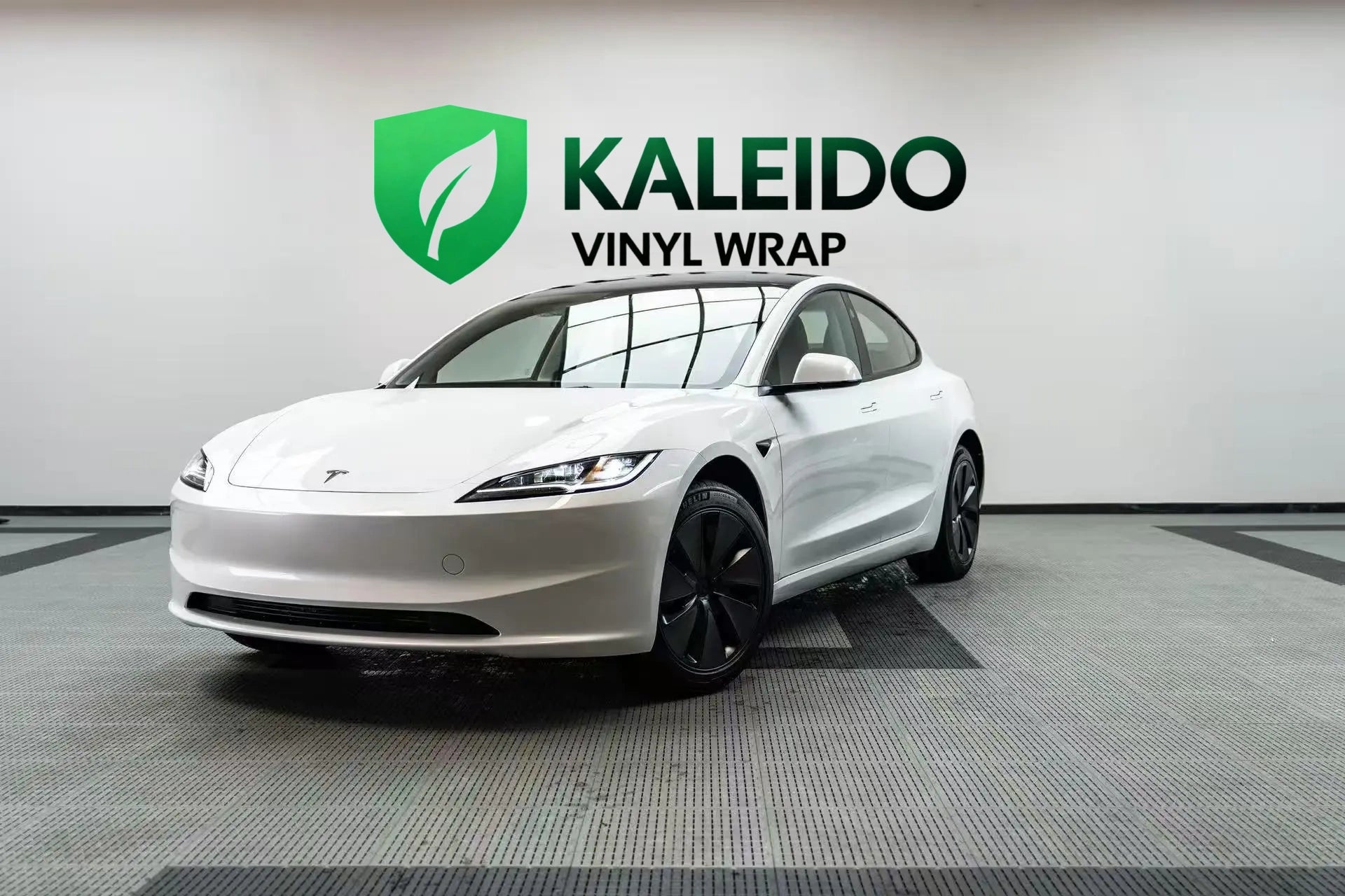 Tesla Model 3 in Gloss Piano White vinyl wrap - front-left view - Kaleido