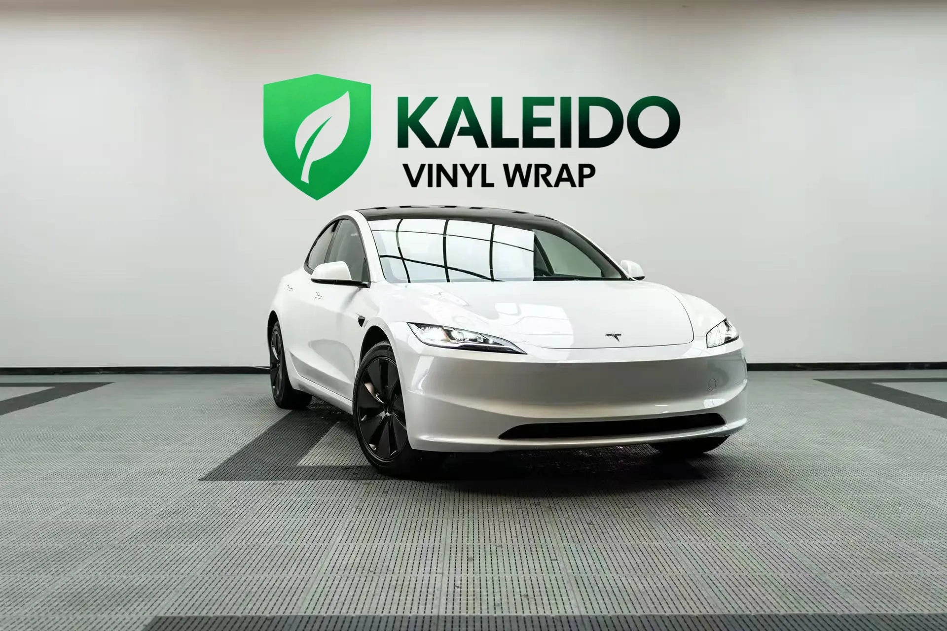 Gloss Piano White vinyl on a Tesla Model 3 - front-right angle - Kaleido