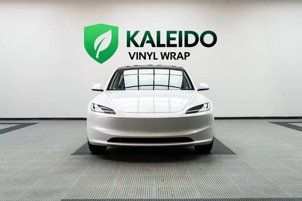 Front view of a Tesla Model 3 wrapped in Gloss Piano White - Kaleido
