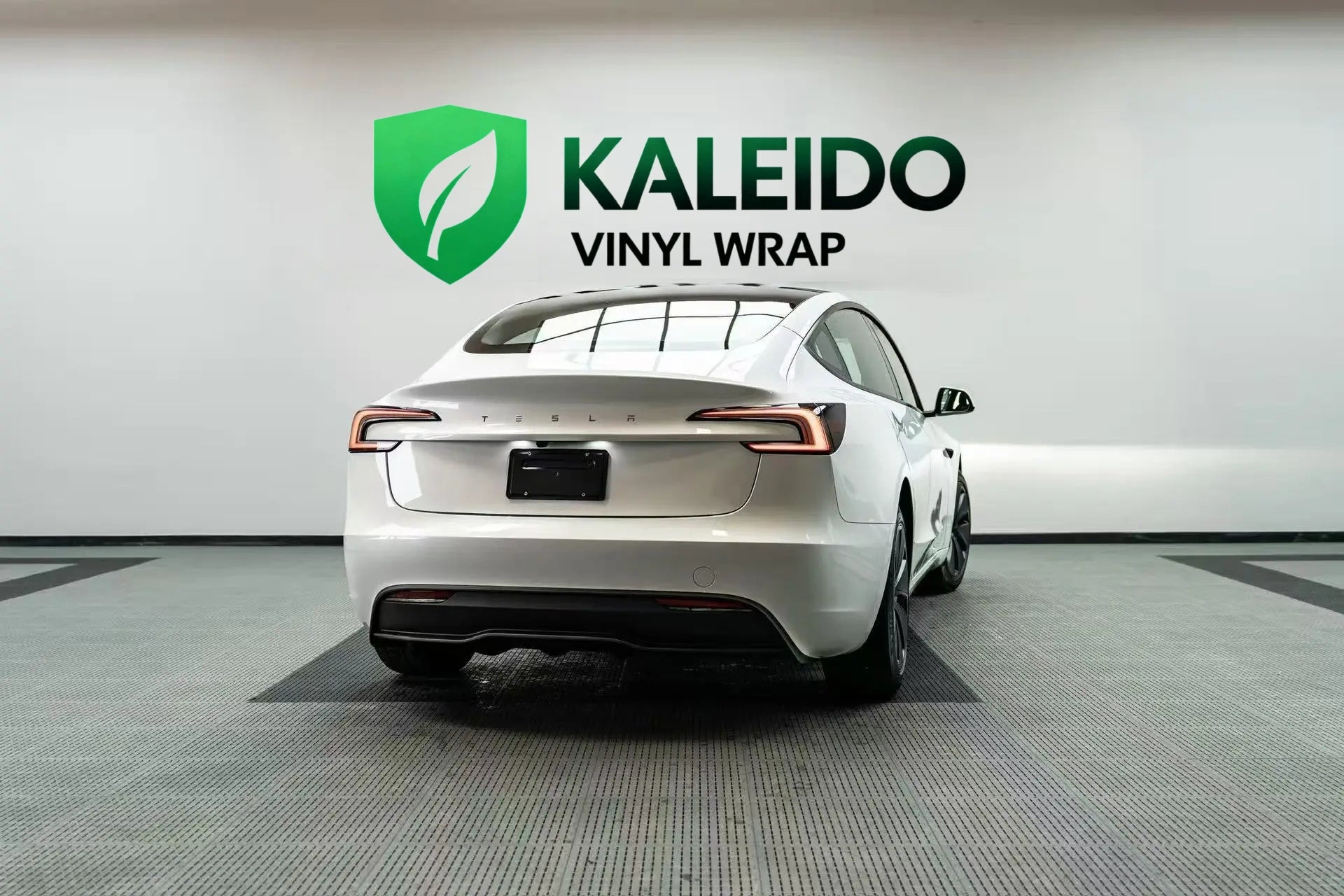 Tesla Model 3 with Gloss Piano White film - rear-right angle - Kaleido