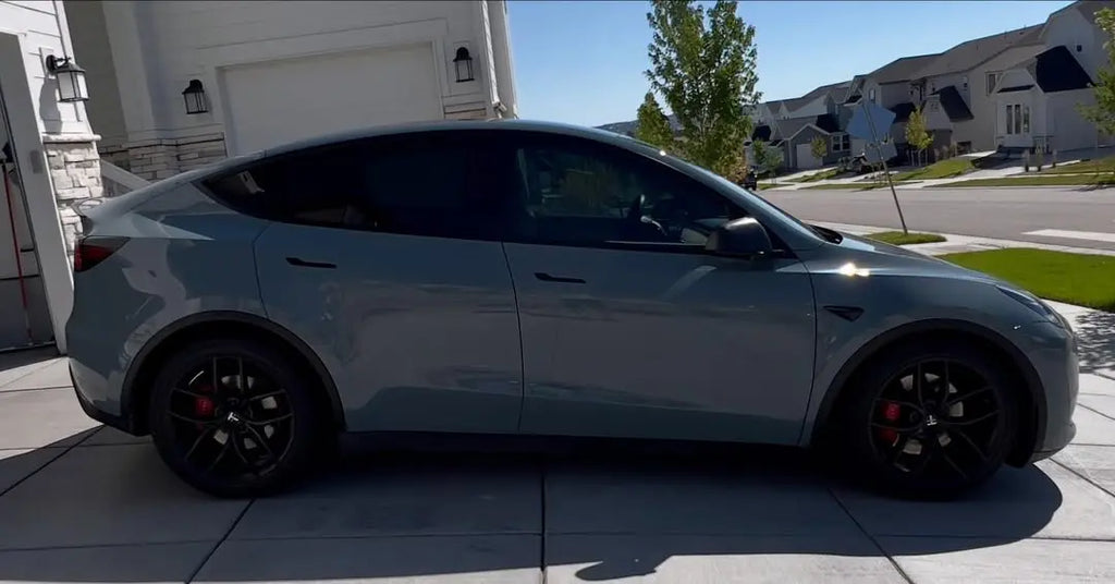Right side view of a Tesla Model Y with Gloss RS Nardo Grey Deep wrap - Kaleido