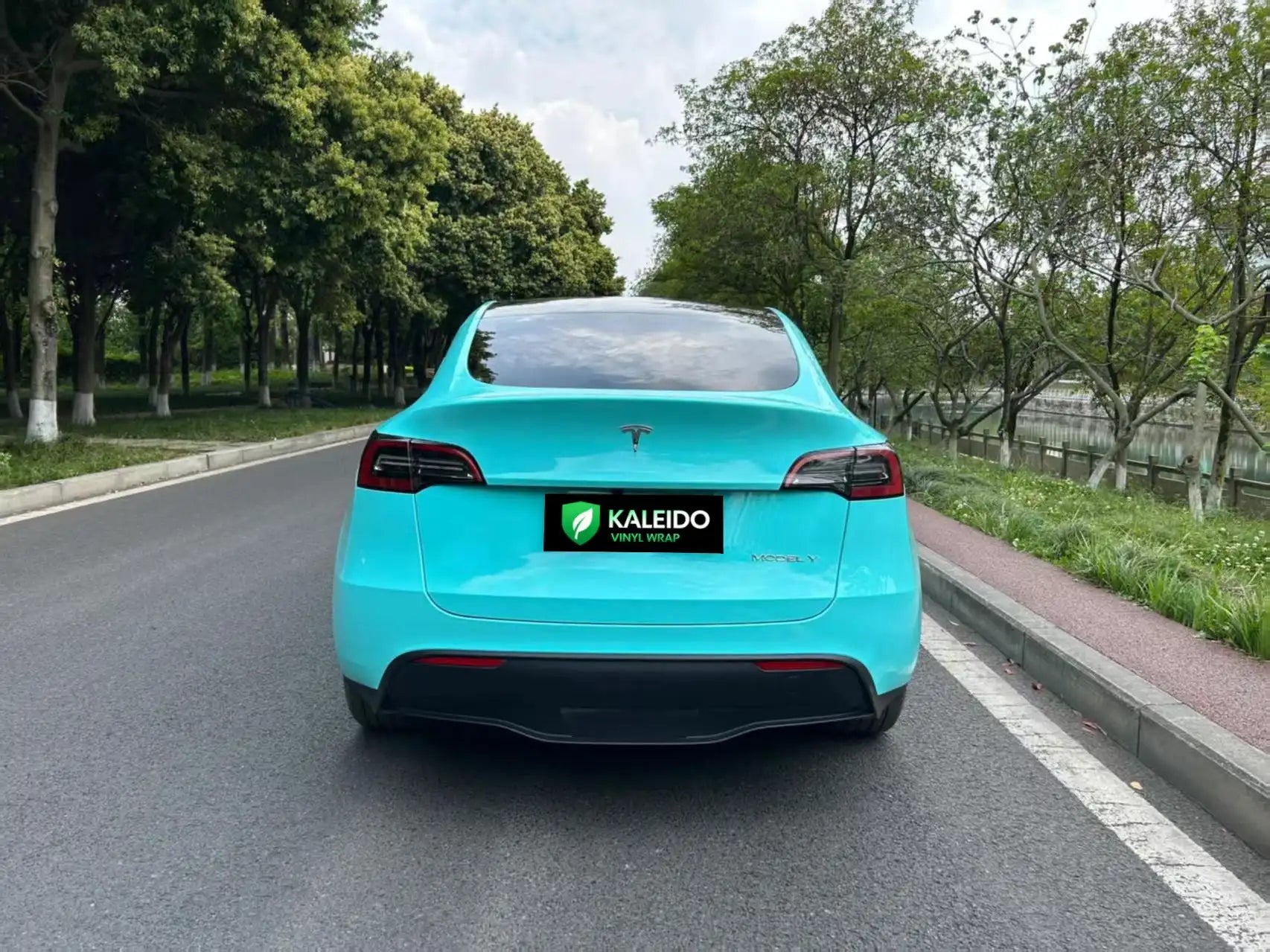 Rear view of Tesla Model Y wrapped in Gloss Tiffany film - Kaleido