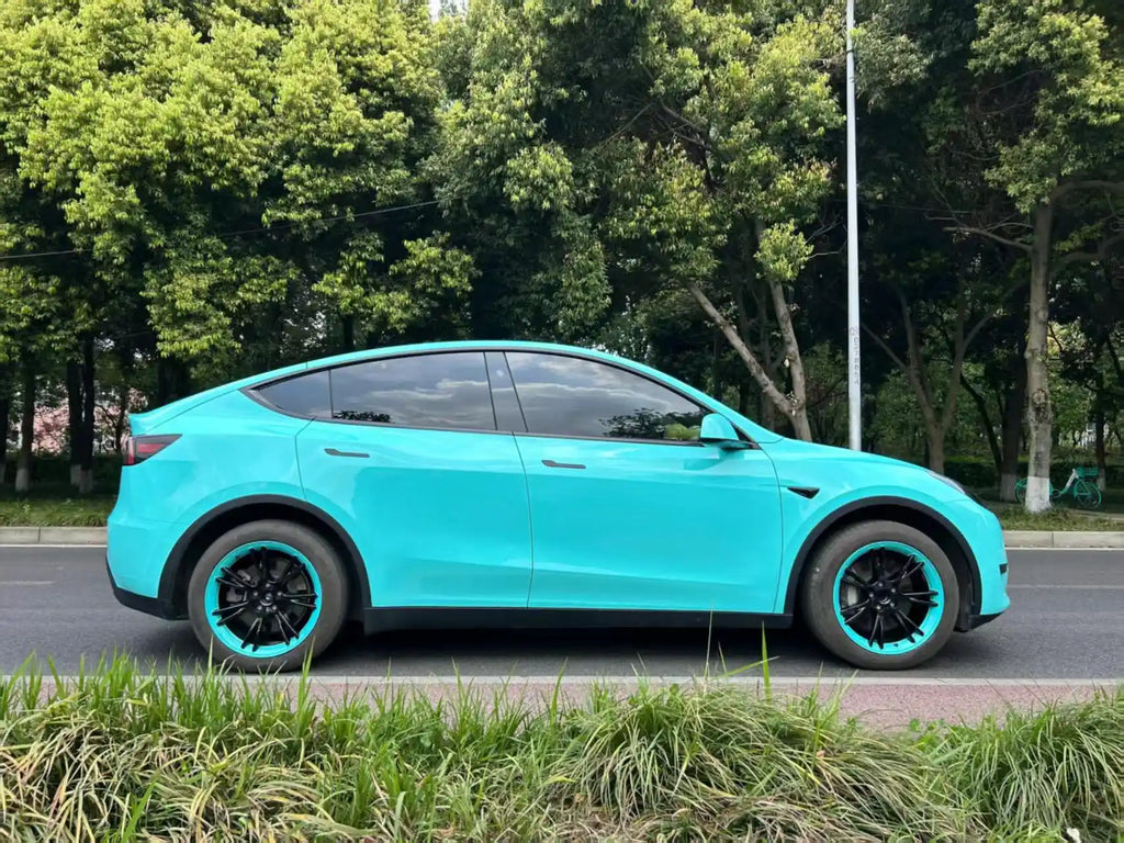 Right side profile of Tesla Model Y with Gloss Tiffany high-gloss wrap - Kaleido