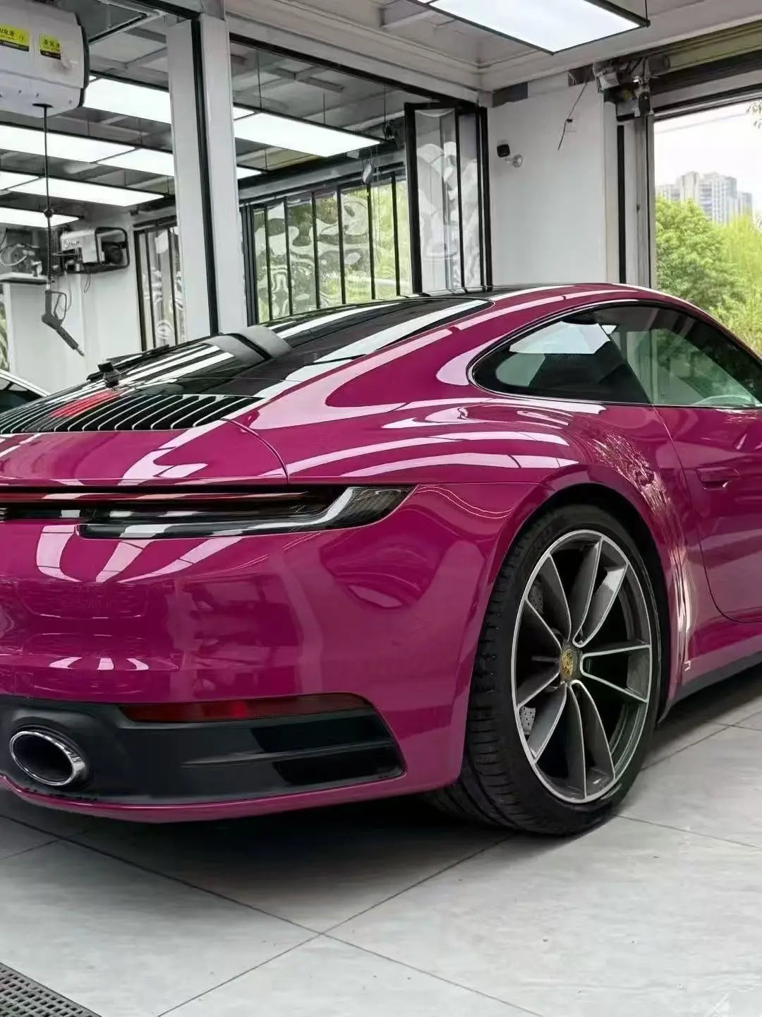 Ruby Night Star gloss vinyl on Porsche 911 Sport Classic rear-right - indoor lighting showcasing color depth - Kaleido