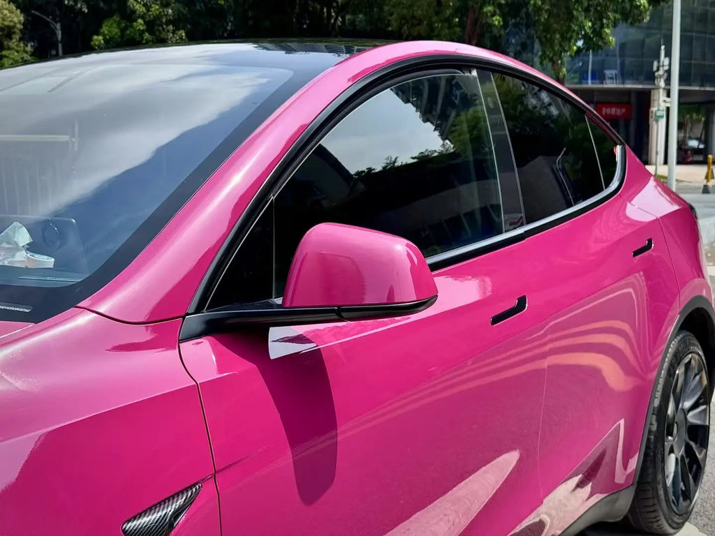 Detailed shot of Ruby Night Star film on Tesla Model Y side panel - perfect color consistency - Kaleido