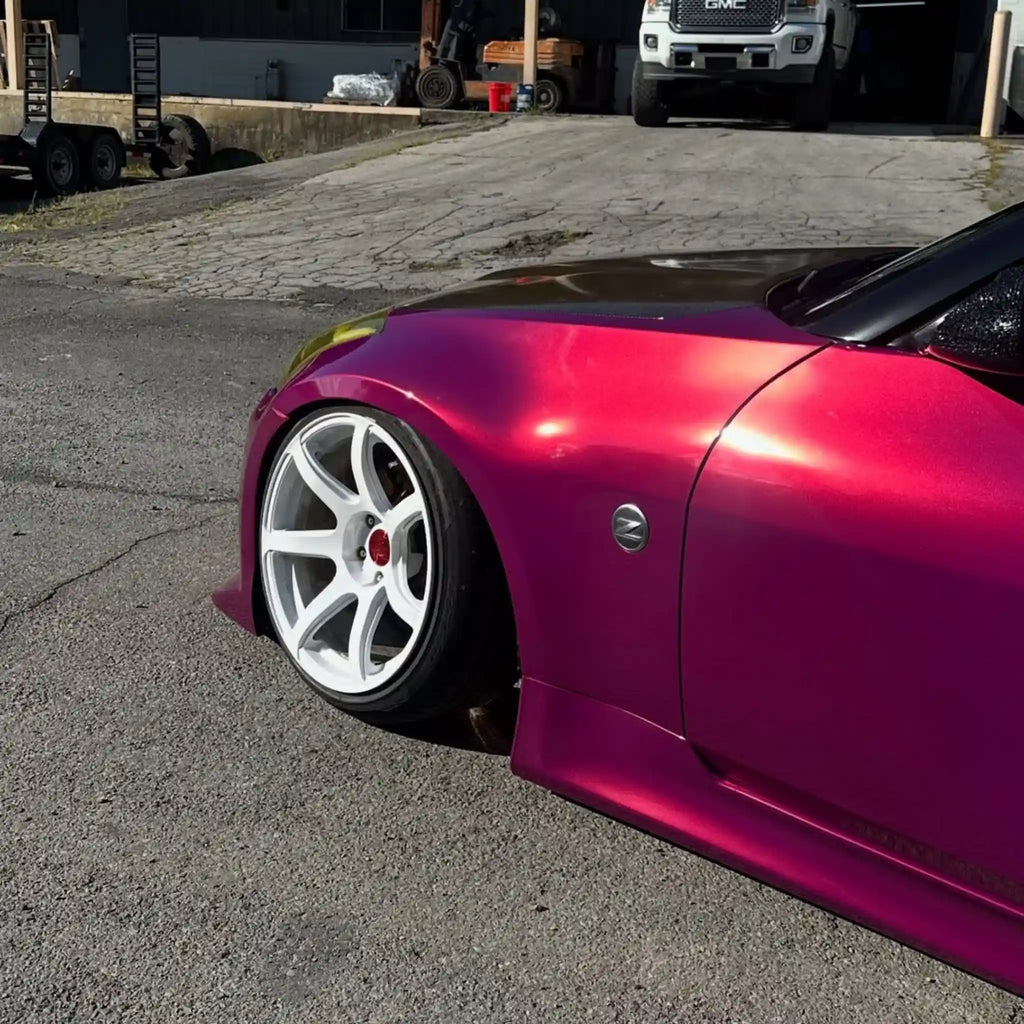 Front-left view of a modified Nissan Silvia S15 in Glossy Metallic Rubellite Purple wrap - Kaleido