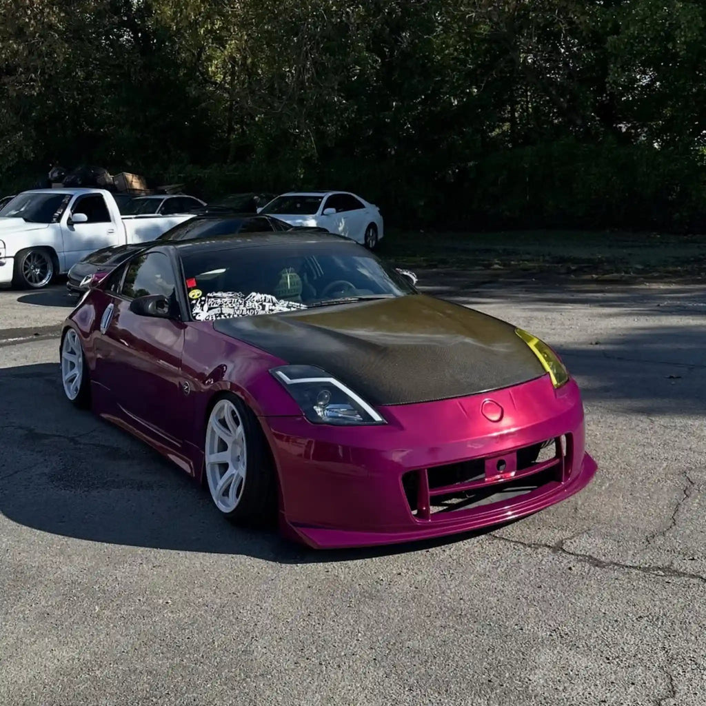 Glossy Metallic Rubellite Purple vinyl on modified Nissan Silvia S15 front-right - Kaleido