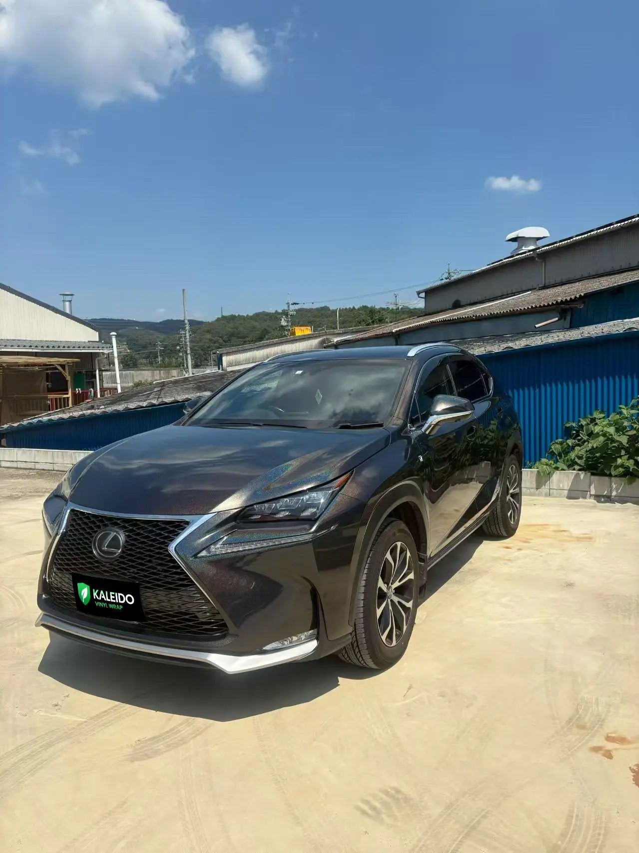 Laser Gloss Black wrap on Lexus NX - front-left holographic effect - Kaleido