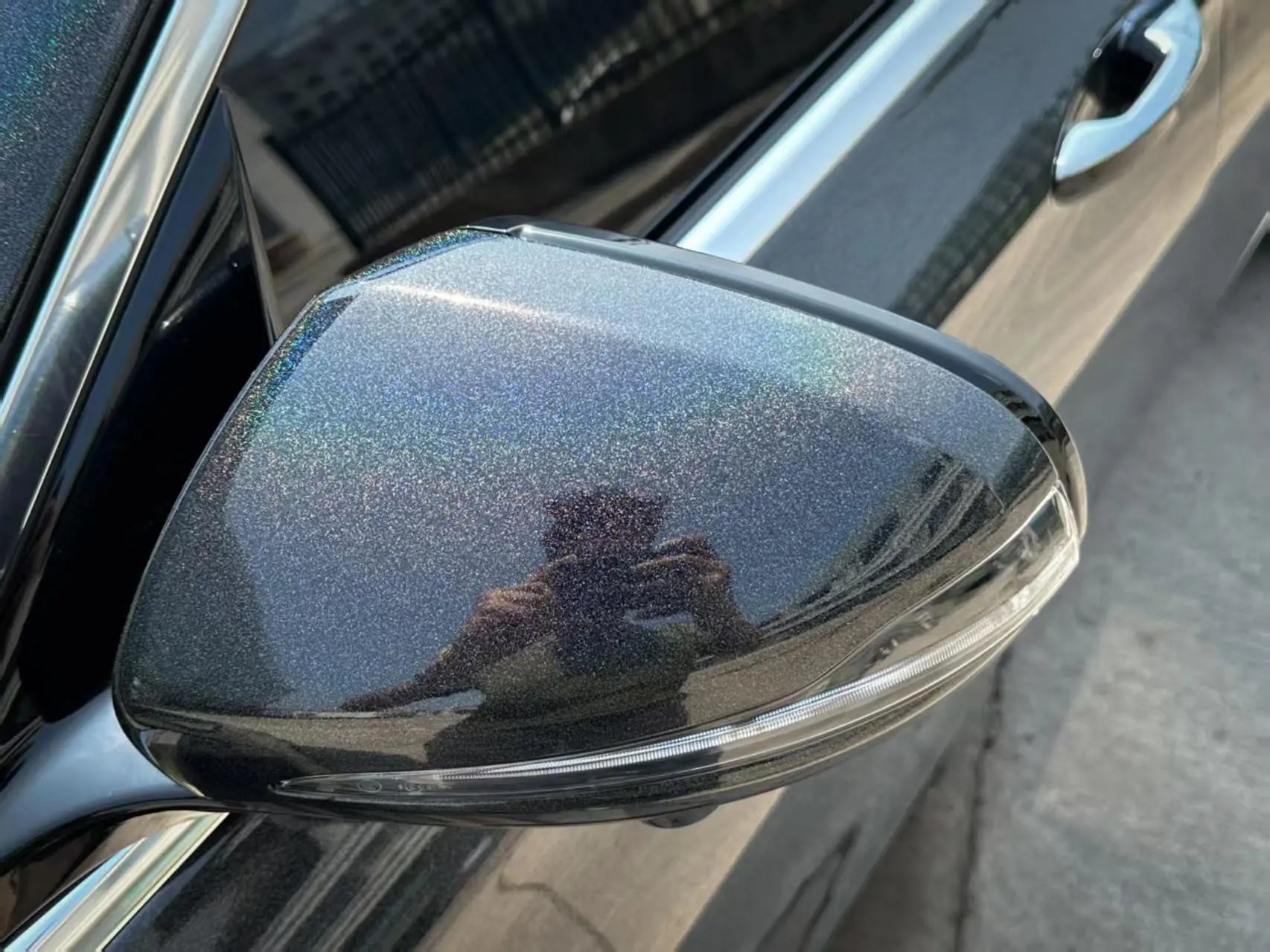 Laser Gloss Black vinyl on Mercedes-Benz E-Class side mirror - rainbow holographic effect - Kaleido