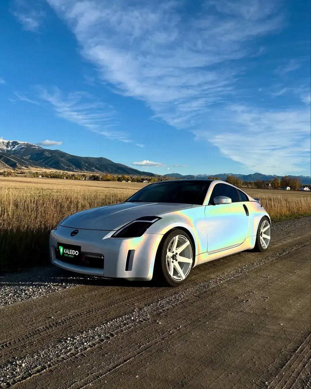 Front-left angle of Laser Gloss Prismatic White wrapped Nissan 350Z - Kaleido