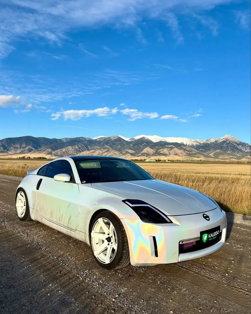 Laser Gloss Prismatic White wrap on Nissan 350Z - front-right view with holographic effect - Kaleido